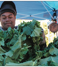 Timothy Christian continues the legacy of his family’s work at the 17th Street Farmers Market. His father, Henry Christian, who died earlier this year, started the stand more than 60 years ago. Christian’s Produce is one of the two original vegetable vendors left at the market.