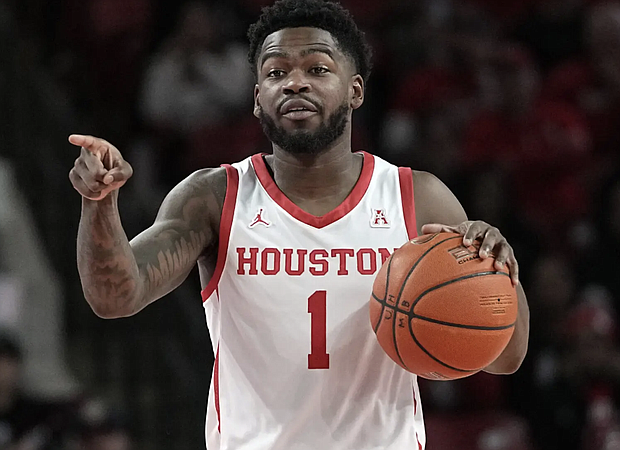 Houston’s Jamal Shead brings the ball up the court against Texas Southern during the first half of an NCAA college basketball game Wednesday, Nov. 16, 2022, in Houston. (AP Photo/David J. Phillip)