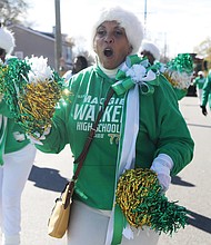 Michelle Johnson Fischer, a Maggie Walker High School Class of 1977 cheerleader, joined other alumnae cheerleaders, during The Armstrong-Walker Football Classic Legacy Project parade along Mechanicsville Turnpike last Saturday.