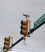 Cameras designed to catch people who run red lights or exceeding speed limits are becoming more visible at various Richmond intersections, including this one at the corners of Lombardy Avenue and Brook Road. However, speed cameras are not at every intersection.
A ticket given due to a photo-enforced red light moving violation is $50.
According to the Insurance Institute for Highway Safety, there are 337 communities nationally using cameras at various intersections, and Richmond is one of 11 cities in Virginia that has adopted the program. So smile, say cheese and slow down.