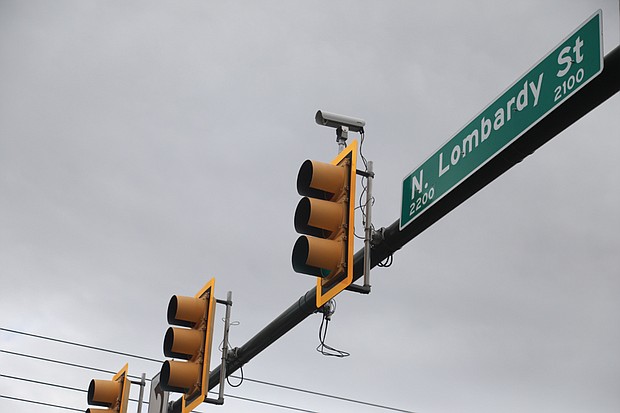Cameras designed to catch people who run red lights or exceeding speed limits are becoming more visible at various Richmond intersections, including this one at the corners of Lombardy Avenue and Brook Road. However, speed cameras are not at every intersection.
A ticket given due to a photo-enforced red light moving violation is $50.
According to the Insurance Institute for Highway Safety, there are 337 communities nationally using cameras at various intersections, and Richmond is one of 11 cities in Virginia that has adopted the program. So smile, say cheese and slow down.