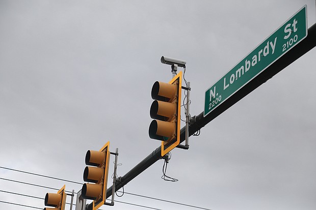 Cameras designed to catch people who run red lights or exceeding speed limits are becoming more visible at various Richmond intersections, including this one at the corners of Lombardy Avenue and Brook Road. However, speed cameras are not at every intersection.
A ticket given due to a photo-enforced red light moving violation is $50.
According to the Insurance Institute for Highway Safety, there are 337 communities nationally using cameras at various intersections, and Richmond is one of 11 cities in Virginia that has adopted the program. So smile, say cheese and slow down.