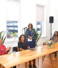 During a panel discussion of “Truth Tellers,” Deborah Little-Bowser of Richmond, center, commends Ms. Davis and other Black women journalists who are featured in the book, which includes Denise Bridges, formerly of The Virginian-Pilot, above left, and Diane Walker, formerly of NBC 12. Mikki Spencer, above standing, was moderator for the panel discussion.