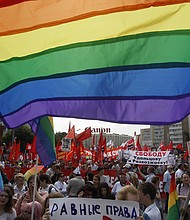 Gay rights activists take part in an opposition protest march in Moscow, June 12, 2013. Russian President Vladimir Putin on Monday signed expanded anti-LGBTQ laws in Russia.
Mandatory Credit:	Maxim Shemetov/Reuters