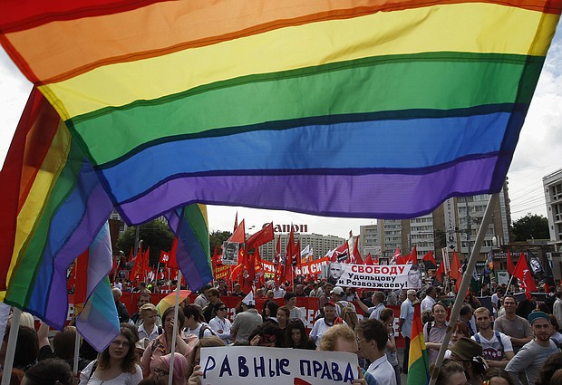Gay rights activists take part in an opposition protest march in Moscow, June 12, 2013. Russian President Vladimir Putin on Monday signed expanded anti-LGBTQ laws in Russia.
Mandatory Credit:	Maxim Shemetov/Reuters