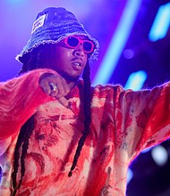 One man has been arrested and charged with murder in connection to the killing of rapper Takeoff, Houston Police Department Chief Troy Finner announced at a news conference on December 2. Takeoff is pictured here in 2021 in Los Angeles.
Mandatory Credit:	Rich Fury/Getty Images North America/Getty Images for Global Citizen