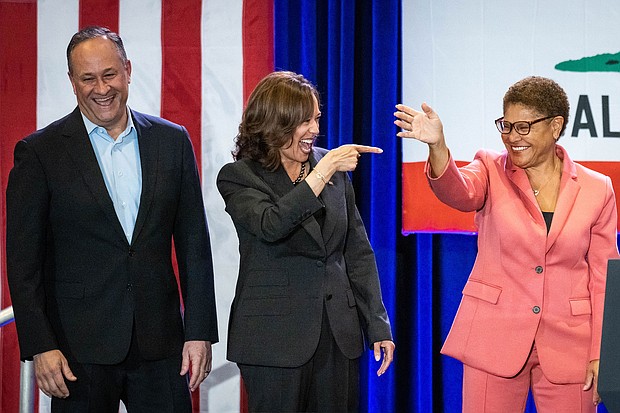 Vice President Kamala Harris (middle) and second gentleman Doug Emhoff (left) join Karen Bass as she campaigns at UCLA in Los Angeles on November 7.
Mandatory Credit:	Sarah Reingewirtz/MediaNews Group/Los Angeles Daily News/Getty Images