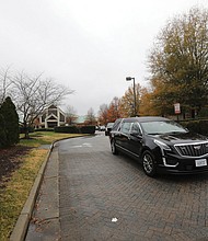 A hearse carrying the body of Congressman A. Donald McEachin leaves The Saint Paul’s Baptist Church on Wednesday following his homegoing service, which drew more than 600 people.