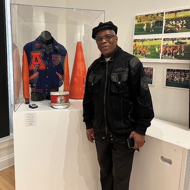 Halim Muhammad, a 1963 graduate of Armstrong High School, waxed nostalgic about his school while Sandra Taylor and Rhonda Johnson Young, Maggie Walker, Class of 1970, held it down for the “Mighty Dragons.” Asked her thoughts about the exhibit, Ms. Taylor replied, “Awesome, awesome.”