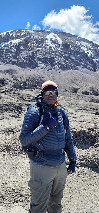 When Robert Dortch Jr. was returning to the United States after reaching Uhuru Peak, the highest point of Mount Kilimanjaro, ...