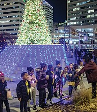 RVA Illuminates Christmas Lights at Kanawha Plaza also added to the river city’s sparkle on Friday, Dec. 2, as Richmonders gathered to snap photos, dance, enjoy the annual light display and take in the movie “Elf.”