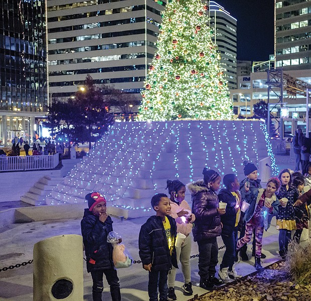 RVA Illuminates Christmas Lights at Kanawha Plaza also added to the river city’s sparkle on Friday, Dec. 2, as Richmonders gathered to snap photos, dance, enjoy the annual light display and take in the movie “Elf.”