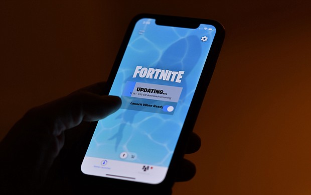 Epic Games, maker of the hit video game "Fortnite," has agreed to pay a total of $520 million to settle US government allegations that it misled millions of players, including children and teens, into making unintended purchases and that it violated a landmark federal children's privacy law.
Mandatory Credit:	Chris Delmas/AFP/Getty Images