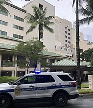 This photo shows the exterior of The Queen's Medical Center in Honolulu where some patients injured by air turbulence on a Hawaiian Airlines flight from Phoenix to Honolulu were taken on December 18.
Mandatory Credit:	Audrey McAvoy/AP