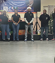 Joaquin Martinez, Director of Community Affairs for the City of Houston (left), representatives from the DMF Group Foundation (center), and Bryan Smart, Founder & CEO of SmartScaping (right) welcome seniors to today’s Holiday Luncheon.