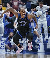 Kentucky’s Dre’una Edwards (44) celebrates after making the winning shot to beat South Carolina in the NCAA women’s college basketball Southeastern Conference tournament championship game Sunday, March 6, in Nashville, Tenn. Kentucky won 64-62.