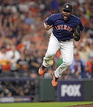 Houston Astros relief pitcher Hector Neris celebrates the last out in the top of the seventh inning in Game 6 of baseball’s World Series between the Houston Astros and the Philadelphia Phillies on Saturday, Nov. 5 in Houston.