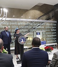 Rabbi Scott Nagel, left, and Cantor Sarah Beck-Berman of Congregation Beth Ahabah participate for the second year in the lighting of the City of Richmond’s menorah in the lobby of City Hall on the second evening of Hanukkah, Monday, Dec. 19. Mayor Levar M. Stoney, seated second from left, Richmond City Council President Cynthia Newbille, and 9th District City Council member Michael J. Jones listened as synagogue leaders performed celebratory songs.