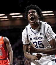 Kansas State forward Nae’Qwan Tomlin (35) celebrates after making a basket during the first half of an NCAA college basketball game against Texas-Rio Grande Valley on Monday, Nov. 7, in Manhattan, Kan.