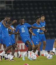 From left, France’s Matteo Guendouzi, Marcus Thuram, Randal Kolo Muani, Kingsley Coman, Raphael Varane, Kylian Mbappe and Olivier Giroud practice Dec. 8 during a training session at the Jassim Bin Hamad stadium in Doha, Qatar. France played England during their World Cup quarter-final soccer match Dec. 10.