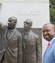 Virginia House Minority Leader Don L. Scott. Jr. stands next to the Virginia Civil Rights Monument at the Virginia State Capitol on June 21.