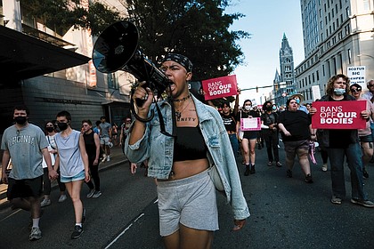 Activist Kam of Catch the Fire helped organize and lead hundreds of men and women during a rally in response to the U.S. Supreme Court’s decision to overturn Roe v. Wade on June 24.