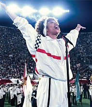 This image released by Sony Pictures shows Naomi Ackie in Tristar’s “Whitney Houston: I Wanna Dance with Somebody.”