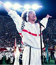 Naomi Ackie as Whitney Houston