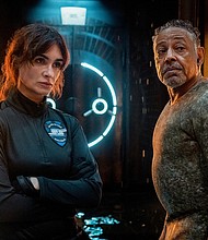 Paz Vega and Giancarlo Esposito try to pull off an elaborate heist in the Netflix series "Kaleidoscope."
Mandatory Credit:	David Scott Holloway/Netflix
