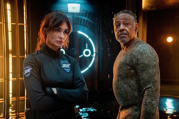 Paz Vega and Giancarlo Esposito try to pull off an elaborate heist in the Netflix series "Kaleidoscope."
Mandatory Credit:	David Scott Holloway/Netflix