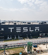 Tesla's shares plunge further on weaker than expected sales. Pictured is the Tesla Gigafactory Shanghai on March 29, 2021 in Shanghai, China.
Mandatory Credit:	Xiaolu Chu/Getty Images