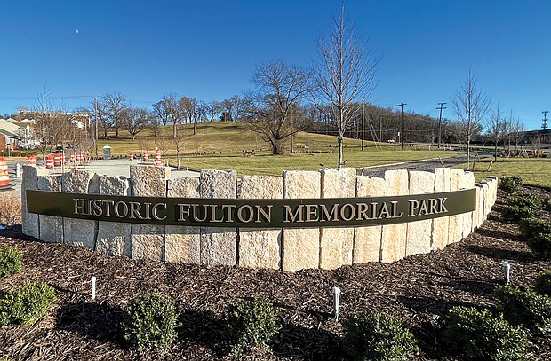 New signage at 5001 Williamsburg Road commemorates Fulton Hill Park and pays tribute to former residents of the once predominantly African-American community who were displaced during urban renewal efforts more than 40 years ago.