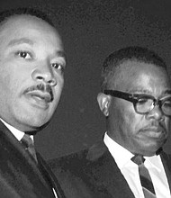 Dr. Martin Luther King Jr. is shown in an undated photo with the late Rev. Curtis W. Harris Sr.