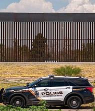 El Paso, Texas, police detained the man who allegedly harassed migrants with a gun on New Year's Eve. An El Paso Police vehicle is seen at the US-Mexico border on July 26, 2021.
Mandatory Credit:	 David Peinado/NurPhoto/Getty Images/File