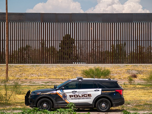 El Paso, Texas, police detained the man who allegedly harassed migrants with a gun on New Year's Eve. An El Paso Police vehicle is seen at the US-Mexico border on July 26, 2021.
Mandatory Credit:	 David Peinado/NurPhoto/Getty Images/File