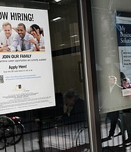 Weekly jobless claims fell to the lowest level since September. A 'now hiring' sign is displayed in the window of a store in Manhattan on December 02, 2022 in New York City.
Mandatory Credit:	Spencer Platt/Getty Images