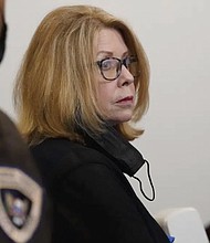 Nancy New, who with her son, Zachary, ran a private education company in Mississippi, pleads guilty to state charges of misusing public money that was intended to help some of the poorest people in the nation, April 26, 2022, at Hinds County Circuit Court in Jackson, Miss. New said in a court document she directed $1.1 million in welfare money to former NFL star Brett Favre at the direction of former Mississippi Gov. Phil Bryant.