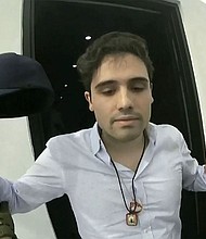 File photo shows Ovidio Guzmán being arrested by Mexican authorities in October 2019.
Mandatory Credit:	Cepropie/AP