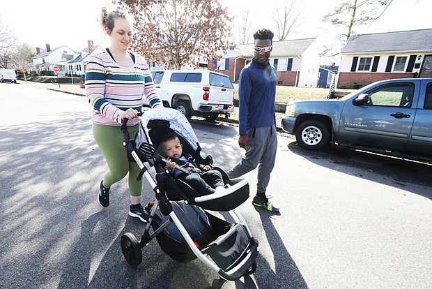 10-month-old Milo Harris could not ask for a better life while out with his parents, Anna Simpson and Justin Harris, along Fauquier Avenue in Richmond’s Bellevue neighborhood on Jan. 18. In addition to spending time with their son, Milo’s parents were enjoying time off from work as a Richmond Montessori School teacher for her and a tennis club employee for him.