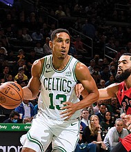 UVA has produced eight current NBA players, including Malcolm Brogdon (with ball) and Jeff Hauser for the Eastern Conference, Atlantic Division leader Celtics (30-12, as Jan. 12).