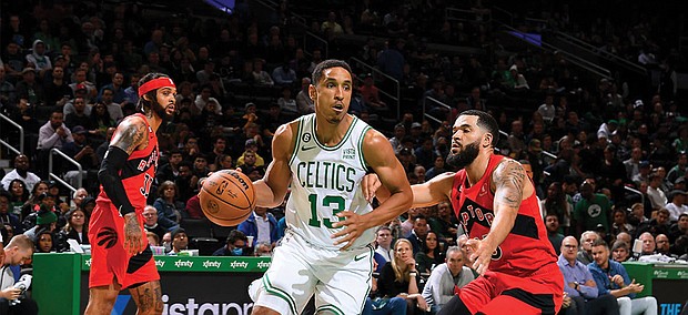 UVA has produced eight current NBA players, including Malcolm Brogdon (with ball) and Jeff Hauser for the Eastern Conference, Atlantic Division leader Celtics (30-12, as Jan. 12).