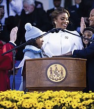 Wes Moore is sworn in as the 63rd governor of the state of Maryland by the state’s Supreme Court Chief Justice Matthew Fader on Jan. 18 in Annapolis, Md.