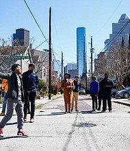 Photo of Charonda Johnson and Houston Freedmen’s Town Conservancy Executive Director Zion Escobar Leading Houston Texans on a Tour of Freedmen’s Town. Image by Priscilla Graham.
