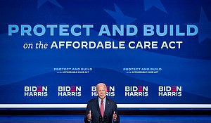Sign-ups for ACA coverage have soared under President Joe Biden.
Mandatory Credit:	Drew Angerer/Getty Images