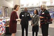 Librarian of Virginia, Dr. Sandra Treadway, left, chats with B.K. Fulton, a Library of Virginia Foundation board member, his wife, Attorney Jackie Stone and Bessida Cauthorne White, an attorney and genealogist who lives in Middlesex County.