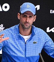 Novak Djokovic said his father, Srdjan, had "no intention" of supporting any kind of "war initiatives" after being filmed with a group of Russian supporters at the Australian Open.
Mandatory Credit:	William West/AFP/Getty Images