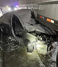 The Kia hit the right rear of the trailer, police said.
Mandatory Credit:	Leawood Police Department/KMBC