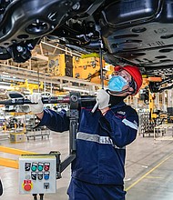 An employee works at an automobile manufacturing enterprise on January 29 in Hefei, Anhui Province of China. Chinese factories resumed work after the Spring Festival holiday.
Mandatory Credit:	Ge Qingzhao/VCG/Getty Images