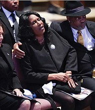 Vice President Kamala Harris sits with RowVaughn Wells and Rodney Wells during the funeral service for Wells’ son, Tyre Nichols, at Mississippi Boulevard Christian Church in Memphis, Tenn., on Wednesday.