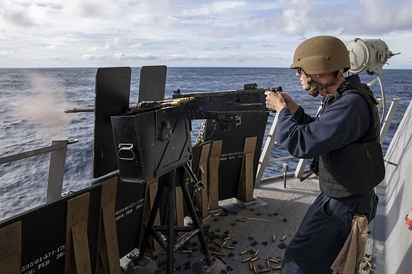 Mineman Seaman Zachary Obert, from Houston, fires an M-2 HB 50 caliber machine gun during a live-fire exercise aboard Independence-variant … Mineman Seaman Zachary Obert, from Houston, fires an M-2 HB 50 caliber machine gun during a live-fire exercise aboard Independence-variant …